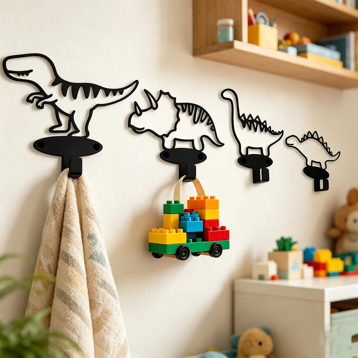 Lot de 4 crochets muraux dinosaures en fer noir : T-rex, tricératops, diplodocus et stégosaure